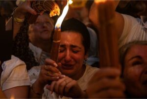 Orthodox Christians gather at the Church of the Holy Sepulchre where many believe Jesus was crucified, buried and resurrected