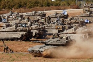 An Israeli tank maneuvers, amid the ongoing conflict between Israel and the Palestinian Islamist group Hamas, near the Israel-Gaza Border, in southern Israel, May 7, 2024