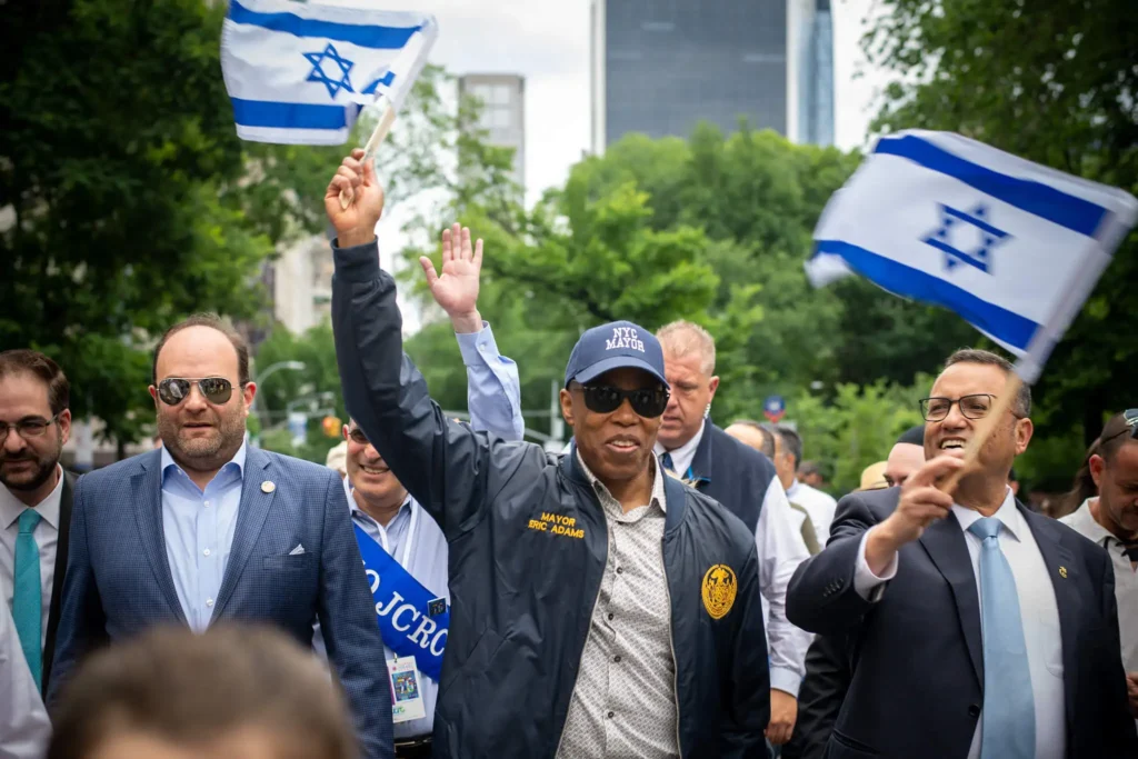 New York City Mayor Eric Adams waves Israel’s flag during the Celebrate Israel parade on June 4, 2023