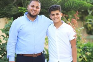 Hamza Dahdouh, left, with his brother, Mahmoud, who was also killed in an Israeli strike.