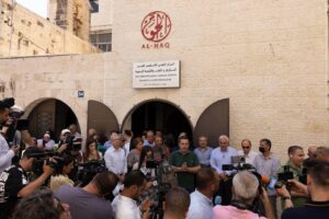 Heads of Palestinian NGOs speak to the media outside of Al-Haq’s offices after the Israeli army raided their offices, Ramallah, West Bank, August 18, 2022.