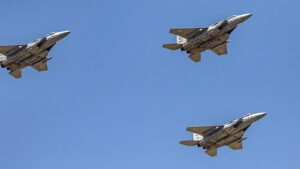 Fighter jets of the F-15D model from the 106th squadron in a close formation flight over Jerusalem, April 2021