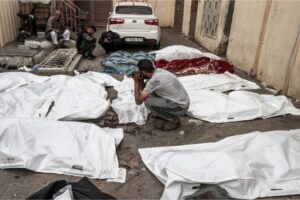 Bodies on the street after Israeli attacks hit Maghazi camp
