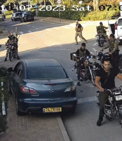 CCTV shot of Hamas gunmen infiltrating Kibbutz Be'eri on October 7, 2023