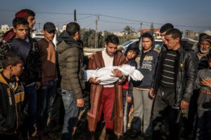 Palestinians bury their relatives who were killed in an Israeli airstrike in Khan Younis, southern Gaza Strip, February 26, 2024. (Abed Rahim Khatib/Flash90)