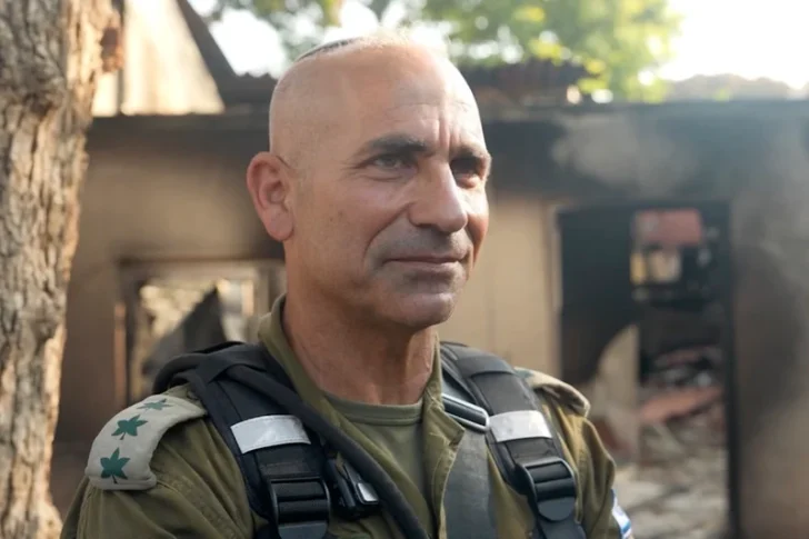 Colonel Golan Vach stands in front of the home of Ohad Cohen in Kibbutz Be’eri on October 14, 2023, where baby Milla Cohen was killed by gunfire through a closed door. 