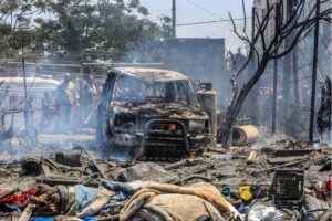 Palestinians inspect the area after an Israeli attack hits displaced people’s camps in Al-Mawasi area of Khan Younis, Gaza on July 13, during which Mohammad Deif was assassinated [Abed Rahim Khatib – Anadolu Agency]