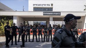 Far-right Israelis and relatives of the soldiers gather in front of the military court building and stage a protest against the arrest of nine soldiers accused of sexually abusing a Palestinian detainee at Sde Teiman Prison in the Negev desert, in Netanya, Israel on July 30, 2024.