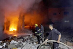 Firefighters intervene fire broke out following Israeli attack on the house of the Al-Tavil family as Israeli attacks continue at Az-Zawayda town of Gaza City, Gaza on December 27, 2023 [Ashraf Amra – Anadolu Agency]