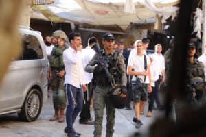 Israeli forces take safety measures as fanatic Jewish settlers organize a provocative march in the Old City under the protection of Israeli forces on July 27, 2024 in Hebron, West Bank. [Amer Shallodi – Anadolu Agency]