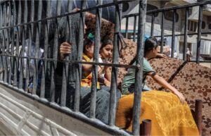 Palestinians, carrying their belongings, are on their way to safer areas following the Israeli army’s warning for the evacuation of Abu Areef and al-Mazra areas in Deir el-Balah [Abed Rahim Khatib/Anadolu Agency]