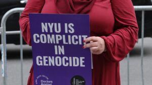 Nurse Hesen Jabr, who was fired from her job after speaking about 'genocide' in Gaza, speaks in front of former employer, Tisch Hospital at NYU Langone Health, in New York City on 14 June 2024 (Michael Santiago/Getty Images via AFP)