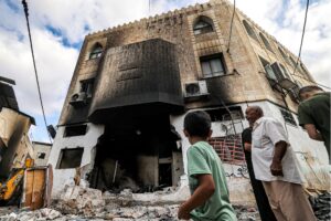 People inspect damage to a mosque following an Israeli military operation in the Fara camp for Palestinian refugees near Tubas in the north of the occupied West Bank on Aug. 29, 2024. (Photo by ZAIN JAAFAR/AFP via Getty Images)