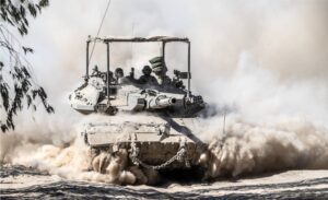 Tanks, armored personnel carriers and military jeeps belonging to the Israeli army are seen from the areas close to the Israel – Gaza Strip border line while Israel’s attacks on the Gaza Strip, which started on October 7, continue uninterruptedly in Israel on July 02, 2024. [Mostafa Alkharouf – Anadolu Agency]