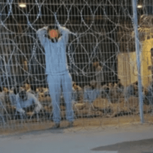 This undated photo taken in winter 2023 and provided by Breaking the Silence, a whistleblower group of former Israeli soldiers, shows blindfolded Palestinians captured in the Gaza Strip in a detention facility on the Sde Teiman military base in southern Israel.