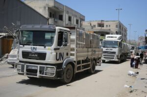 Aid trucks of the United Nations Relief and Works Agency for Palestinian Refugees in the Near East (UNRWA) deliver aid to Salah al-Din Street, Gaza City, Gaza on June 19, 2024. Dawoud Abo Alkas/Anadolu via Getty Images