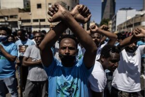 Eritrean asylum seekers stage a protest in front of the Eritrean Embassy building in Tel Aviv, Israel on September 02, 2023. Eritrean asylum seekers in Israel marched towards the embassy building to protest an event organized by the Eritrean Embassy in Tel Aviv. [Mostafa Alkharouf – Anadolu Agency]