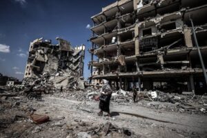 Palestinians remove whatever belongings they can salvage from the area as the devastation left by the Israeli army’s withdrawal comes to light in eastern Deir al-Balah, Gaza on August 29, 2024. [Ali Jadallah – Anadolu Agency]