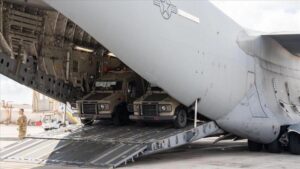 A plane with armored vehicles for the Isaeli army arrives at Ben Gurion Airport, October 19, 2023. (Photo credit: Israel Defense Ministry)