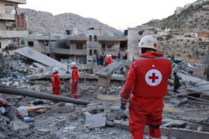 Lebanese Red Cross teams conducted search and rescue operations in the rubble of collapsed buildings following an Israeli army attack in Nabatieh province of southern Lebanon, on September 27, 2024.[Ramiz Dallah – Anadolu Agency]