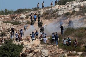 Israeli forces intervene in the protest held by Palestinians against illegal Israeli settlers who set up encampments at Umm Safa village, north of Ramallah, West Bank on September 14, 2024. [ Issam Rimawi – Anadolu Agency]