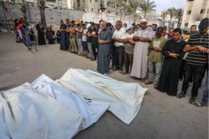 Relatives of the Palestinians who died as a result of Israeli attacks on Asdaa area, northwest of Khan Yunis, perform funeral prayer after bodies were taken from Nasser Hospital for burial in Khan Yunis, Gaza on September 03, 2024 [Abed Rahim Khatib/Anadolu Agency]