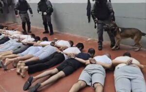 Photos and videos obtained by Haaretz show dozens of detainees lying on their stomachs while handcuffed, some without clothes, as a guard dog barks over their heads. The Prison Service described this as a "routine exercise."