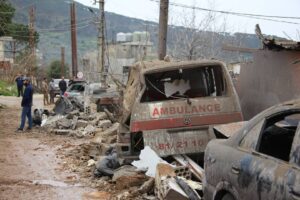 Cars that has become unusable are seen after Israeli air strikes on southern Lebanon, Hebbariyeh town on March 27, 2024 [Ramiz Dallah – Anadolu Agency]