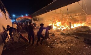 Fire breaks out in tents housing displaced Palestinians after Israeli forces bombed the courtyard of Al-Aqsa Martyrs Hospital in Deir al-Balah, Gaza on October 14, 2024.