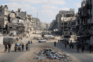 Carrying their belongings, Palestinians flee areas north of Gaza City in the northern Gaza Strip on Saturday, Oct 12