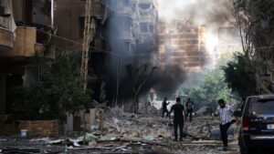 Residents check the damaged in the aftermath of overnight Israeli bombardment in Beirut’s southern suburbs, on September 28, 2024.