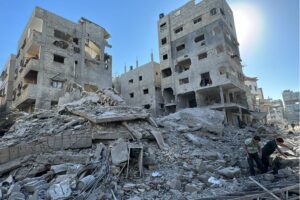 Palestinians inspect the damage after an Israeli airstrike the previous night in Beit Lahia, in the northern Gaza Strip on October 20, 2024.