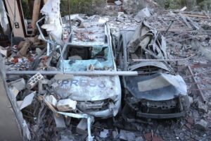 A view of the damaged cars after the Israeli strike targeted a hotel where the journalists were staying in Hasbaiyya town of Nabatieh in southern Lebanon on October 25, 2024.