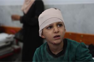 Residents and civil defence after an Israeli army strike on Asma School, run by UNRWA, in Gaza City on October 27, 2024