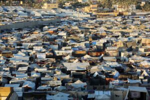 Gaza's evacuees set up makeshift tents wherever they can find space.