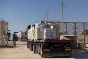 Trucks carrying humanitarian aid cross into the Gaza Strip in Erez West Crossing, Israel on November 11, 2024