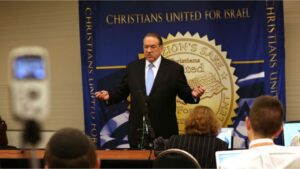 Mike Huckabee speaks during a news conference at the Christians United for Israel’s 10th annual summit on July 13, 2015, in Washington, DC