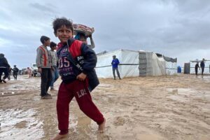 Palestinian families, forcibly displaced by Israeli army and living in tent camps, struggle due to harsh weather conditions amid the ongoing Israeli attacks in Khan Younis, Gaza, November 24, 2024.