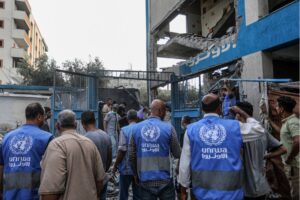 Palestinians and UN workers examine the destruction after an Israeli attack hits an UNRWA school, killing and injuring many in Nuseirat Refugee Camp of Deir al-Balah, Gaza on July 15, 2024