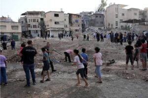 Palestinians inspect damaged homes after Israeli soldiers withdraw from Nur Shams and Tulkarm refugee camps following a 13-hour raid, in Tulkarm, West Bank on October 31, 2024