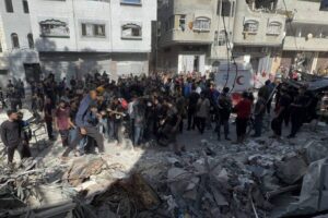 Residents conduct a search and rescue operation after the Israeli army targeted Asma School, run by the UN agency for Palestinian refugees (UNRWA) in the Shati refugee camp in Gaza Strip on October 27, 2024