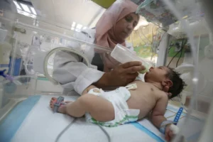 A premature baby receives care at al-Aqsa hospital in Deir al-Balah in the central Gaza Strip in May. Israel’s brutal 13-month long assault on Gaza has caused a spike in premature births and congenital deformities.