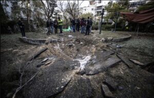 Israeli civil defense members conduct investigation operation after a missile launched from Yemen hits residential neighborhood in Tel Aviv, Israel on December 21, 2024.