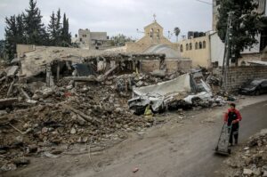 A young boy walked in front of St. Porphyrius, a Greek Orthodox Church in Gaza that was damaged during an Israeli bombardment.