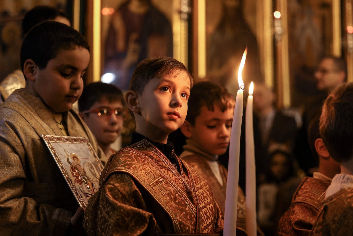 Children at an Orthodox Christmas Mass at the Church of Saint Porphyrius in Gaza City on Jan. 7, 2023.