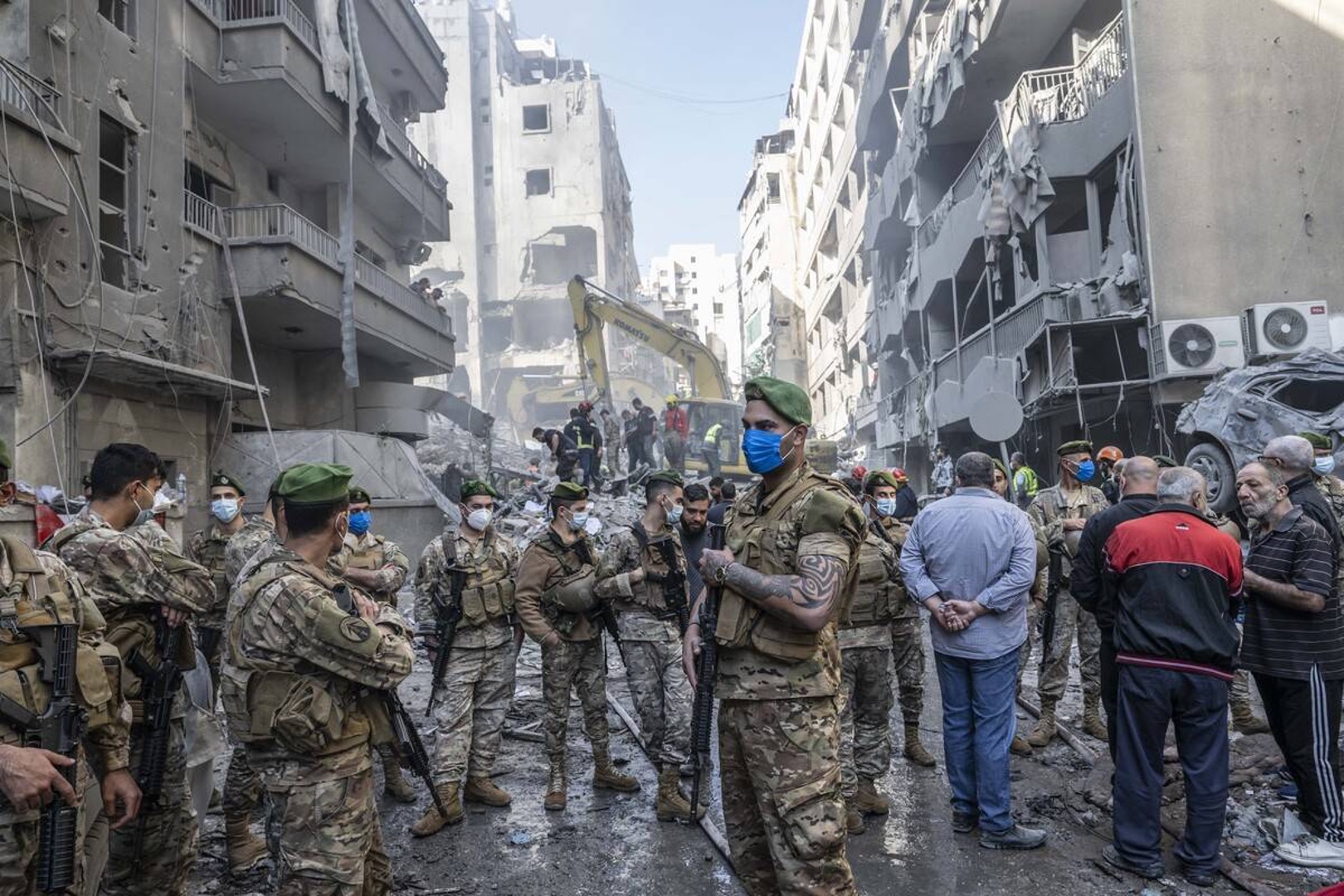 Civil defense team and soldiers conduct a search and rescue operation following a powerful Israeli airstrike that targeted the Basta area in Beirut, Lebanon on November 23, 2024.