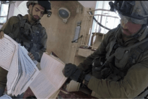 Israeli soldiers burn copies of the Holy Quran in Khan Younis.