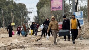 Palestinian families forced to flee their homes, on the move, January 22, 2025 in Jenin, West Bank