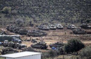 A large number of tanks belonging to the Israeli army are deployed near the Israeli border on December 4, 2024.