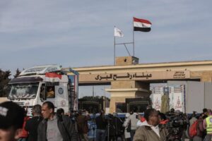 Humanitarian aid trucks, crossing from Egypt to Rafah, wait on the border after the announcement of ceasefire, January 19, 2025 in Egypt